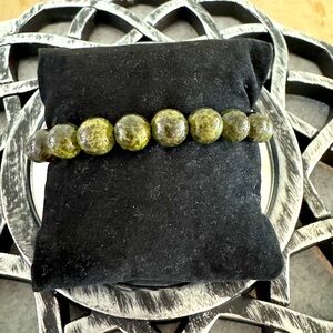 SOLD. Preview vintage East Asian stone beaded stretch bracelet 2 1/4” d